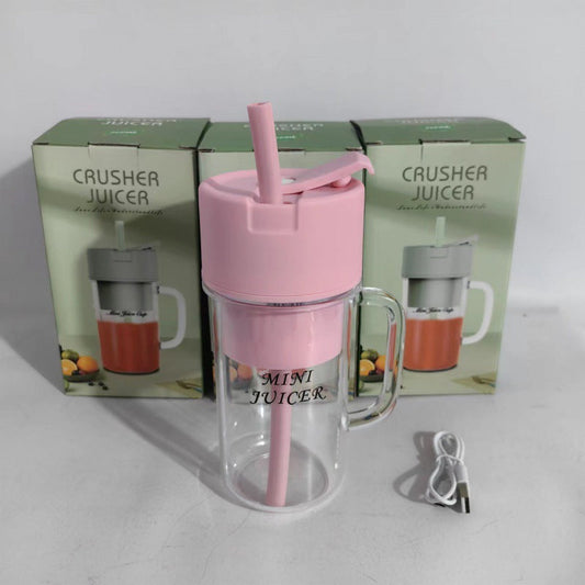 Portable rechargeable 500 ml juice blender with straw.